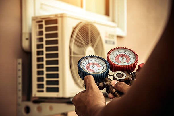 Professional Air Conditioning Service technician working in Denham Springs, LA
